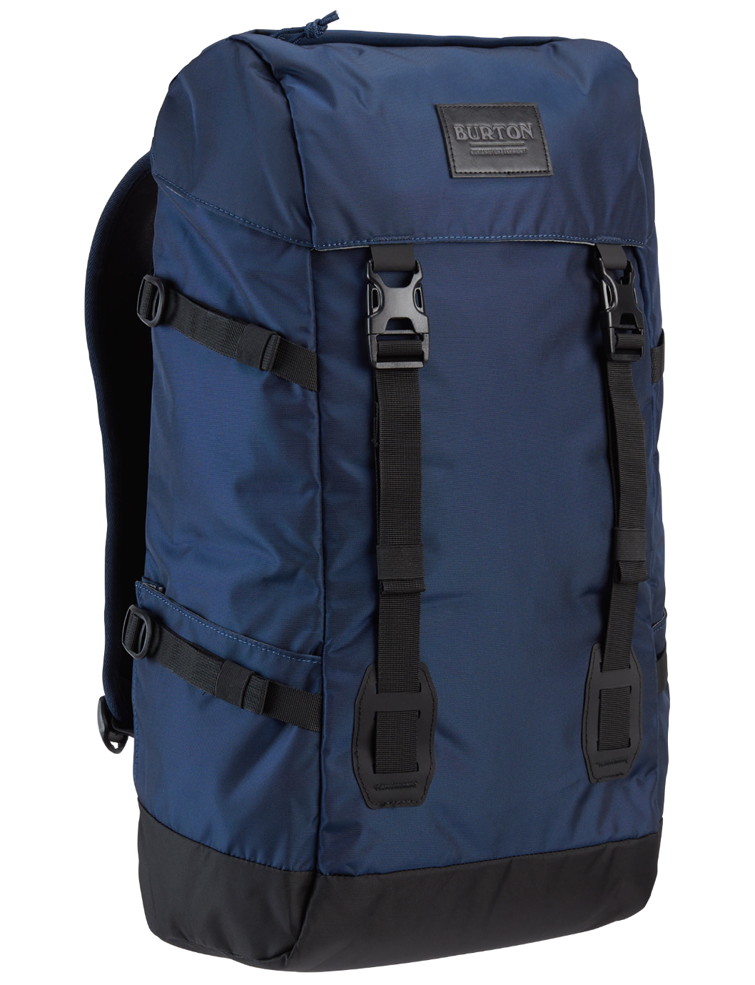 A navy blue Burton rucksack backpack on a white background