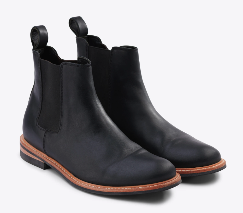 A black pair of Nisolo slip-on boots