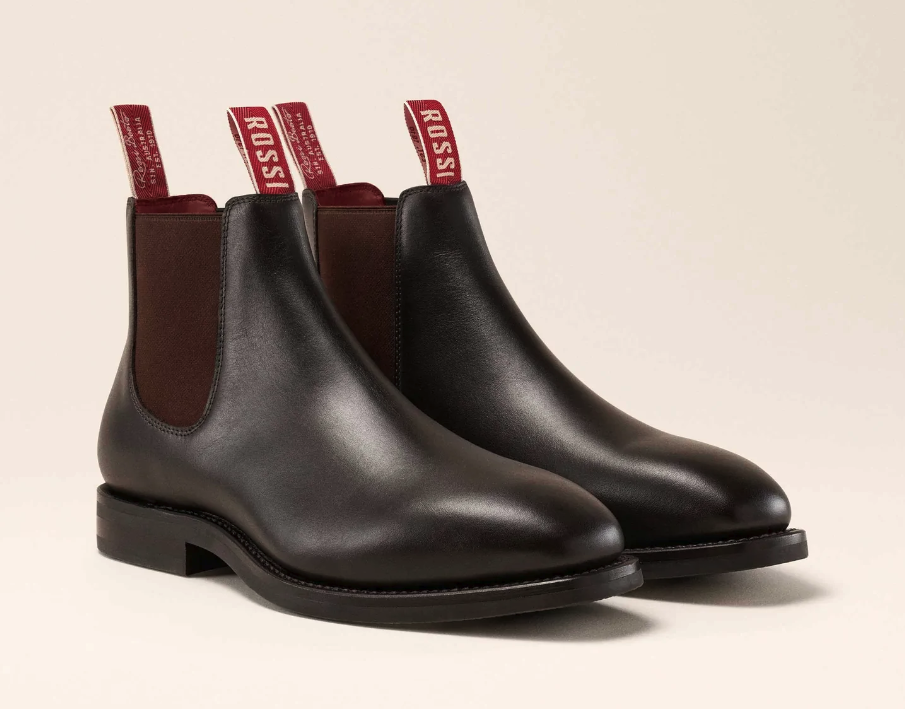A pair of brown leather Rossi slip-on boots