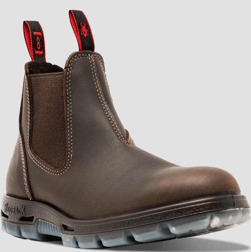 A pair of brown Redback slip-on workboots