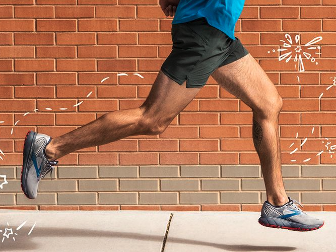 A man running in Brooks sneakers