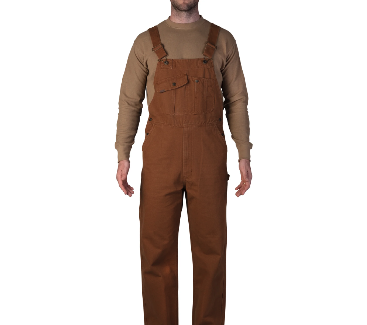 A man wearing a brown workwear overalls by Smith's