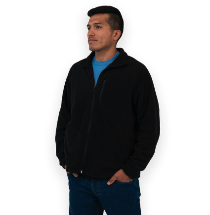 A man wearing a casual Key Apparel zip sweater with a blue shirt underneath