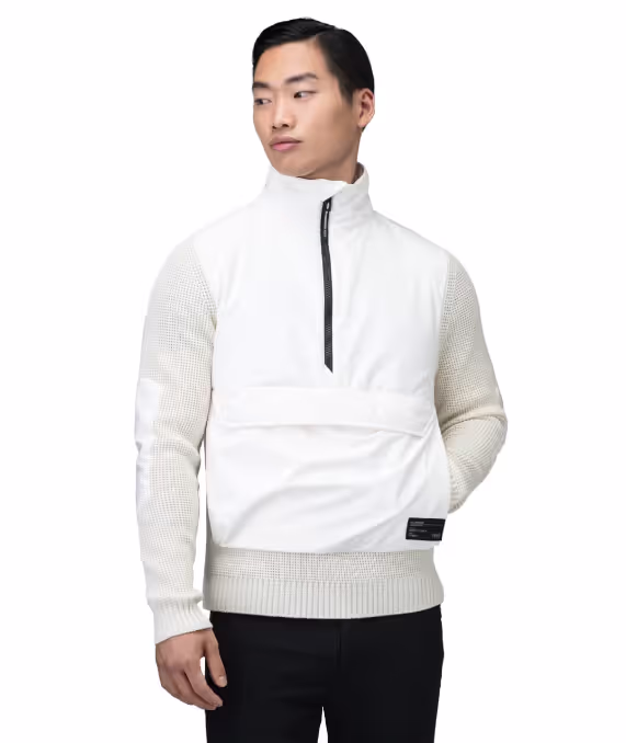A man wearing a white futuristic Nobi jacket