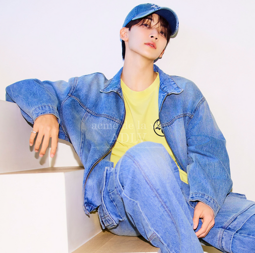 A man wearing a denim outfit by ACMÉ DE LA VIE