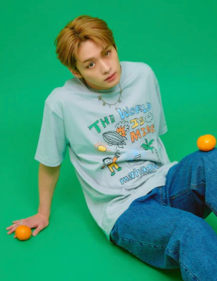 A man wearing a blue cartoon shirt by Mahagrid