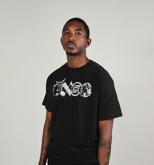 A man wearing a ICE CREAM black t-shirt