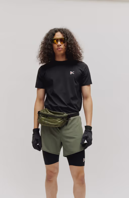 A man wearing ultralight aloe short sleeve black tee