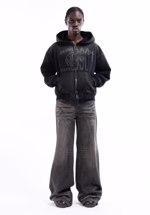 A man wearing split zip jacket used black