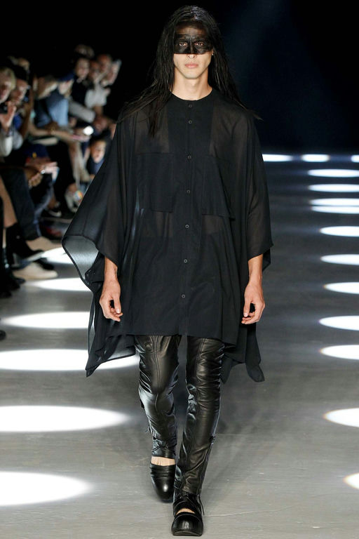 A runway model wearing an Alexandre Plokhov all black outfit