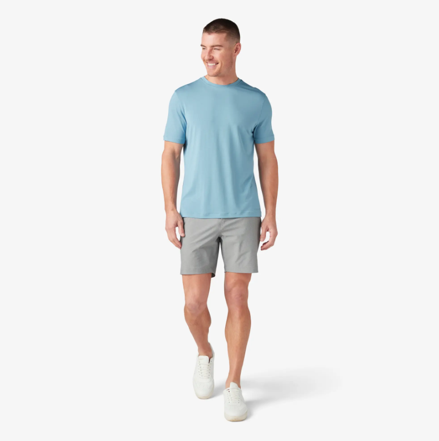 A man wearing dusty blue knox t-shirt by Mizzen+Main