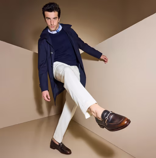 A man wearing a Allen Edmonds randolph penny loafer
