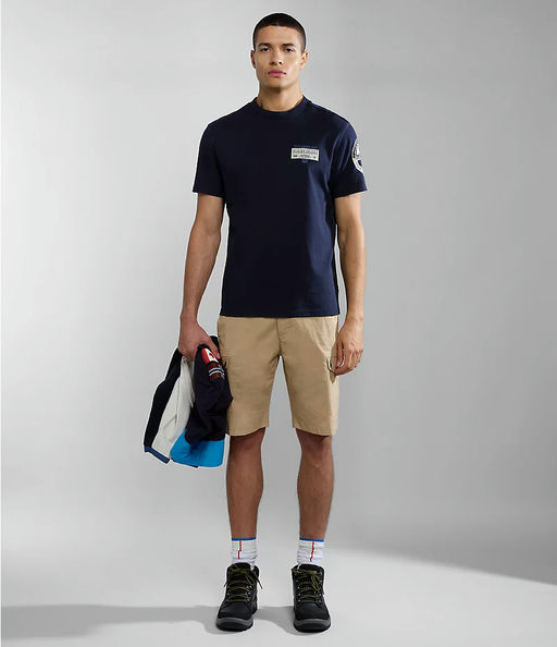 A man wearing Napapijri dark blue amundsen short sleeve t-shirt