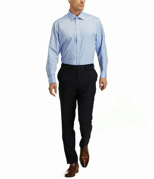 A man wearing Hickey Freeman modern fit spread collar solid dress shirt - blue