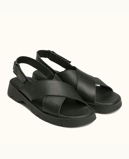 An image of Kleman black leather cross-strap sandals
