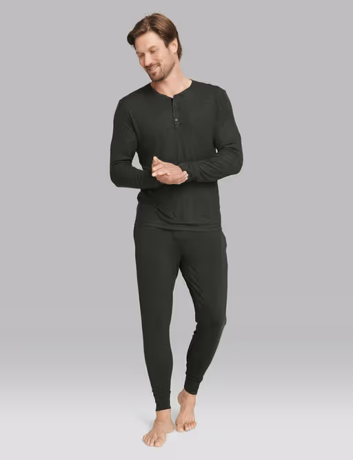A man wearing Tommy John charcoal heather downtime henley pajama tee