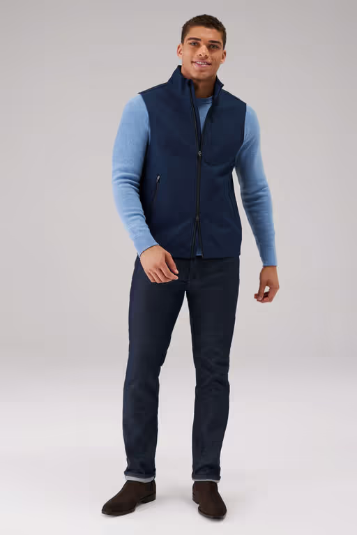 A man wearing Mack Weldon true navy heather latitude vest