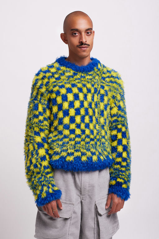 A man wearing HIBU lisbon handmade 2020vision knit jumper