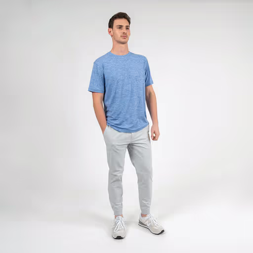 A man wearing Rhoback short sleeve tailwind performance tee