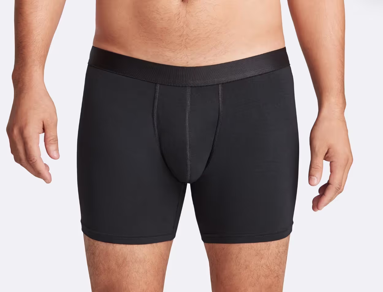 A man wearing a black pair of MeUndies boxers