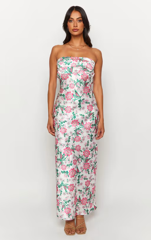 A woman wearing Beginning Boutique astra strapless floral satin midi dress