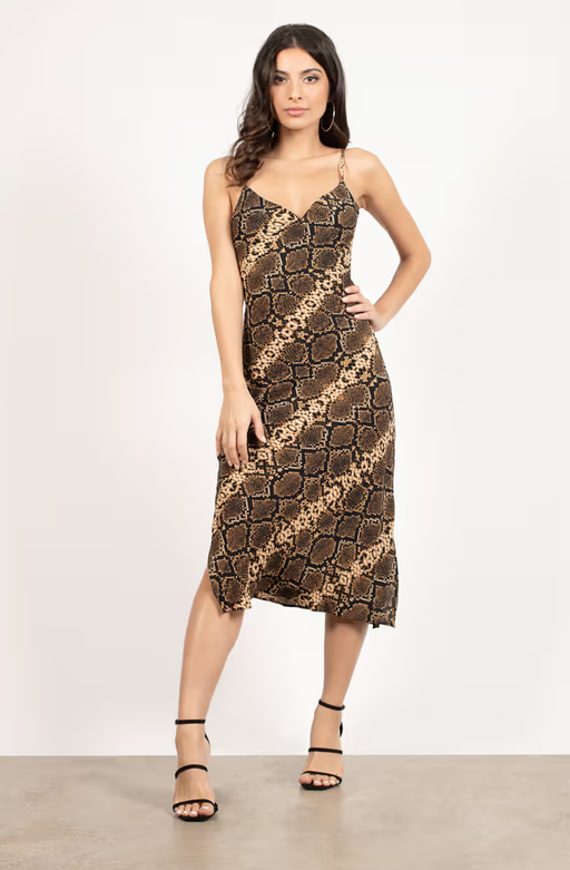 A woman wearing Tobi in the shadows snake print cami midi dress - brown multi