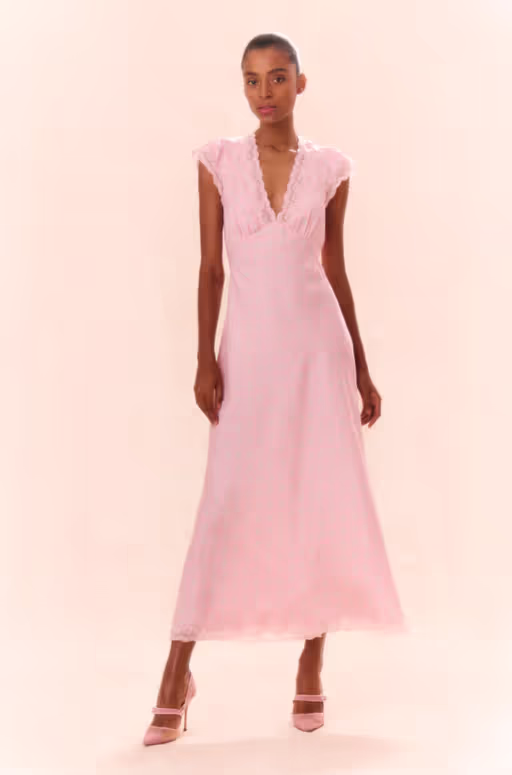 A woman wearing LoveShackFancy dusty quartz theodore printed maxi dress
