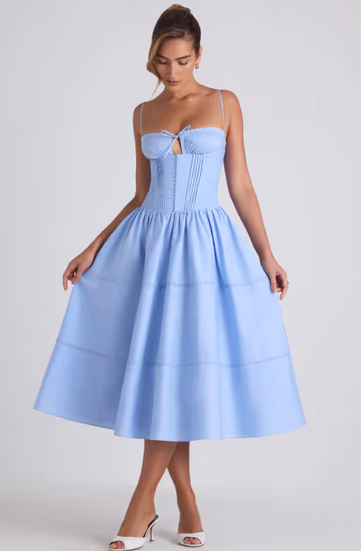 A woman wearing Oh Polly lace-trim pintucked poplin midaxi dress in sky blue