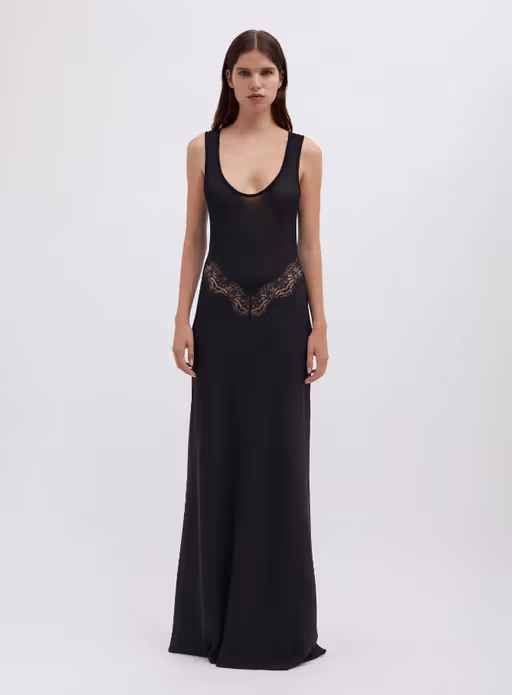 A woman wearing Christopher Esber black verna lace tank dress
