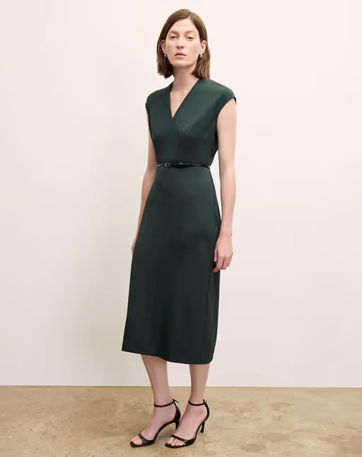A woman wearing MM Lafleur​ the vienna dress - recycled wondertex