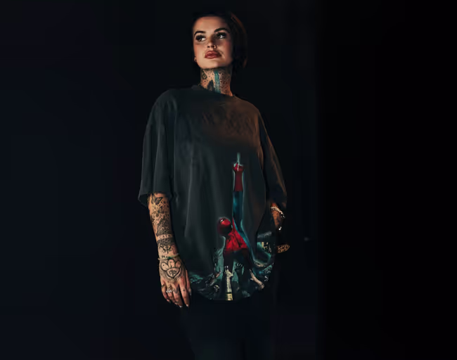 A woman wearing Civil  Regime​ printed black t-shirt