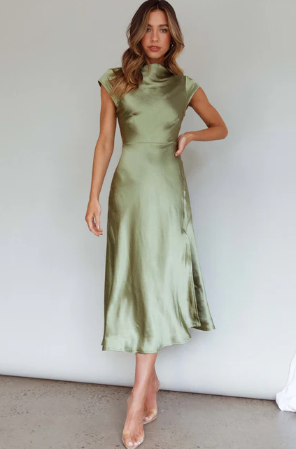 A woman wearing Selfie Leslie​ lucinda twist back midi dress olive