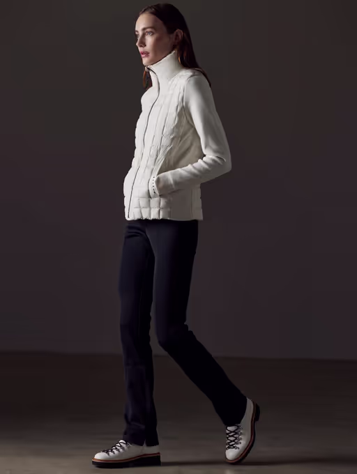 A woman wearing AETHER​ Apparel phase full-zip