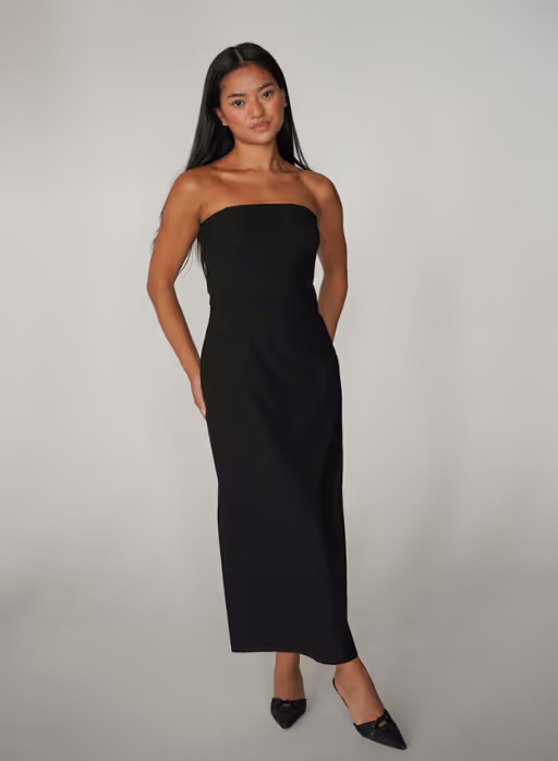 A woman wearing Djerf Avenue​ midi tube dress black
