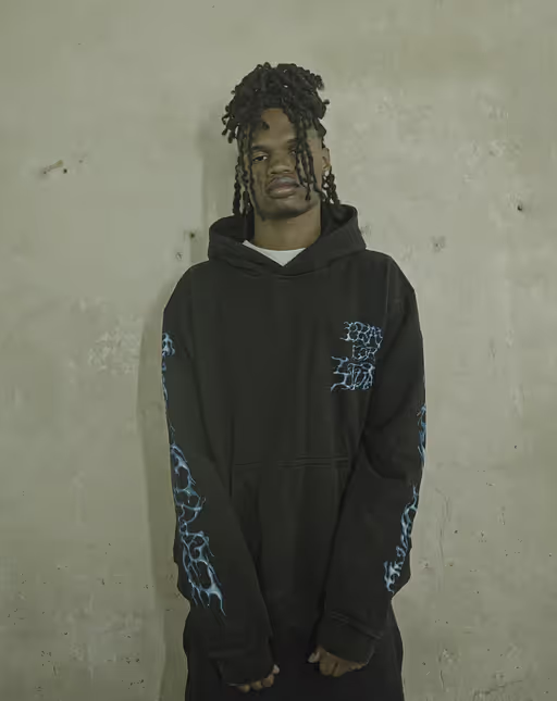 A man wearing 4tune​ azula hoodie