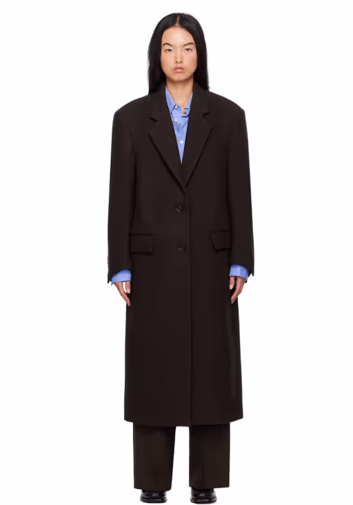 A woman wearing Recto brown single breasted tailored coat