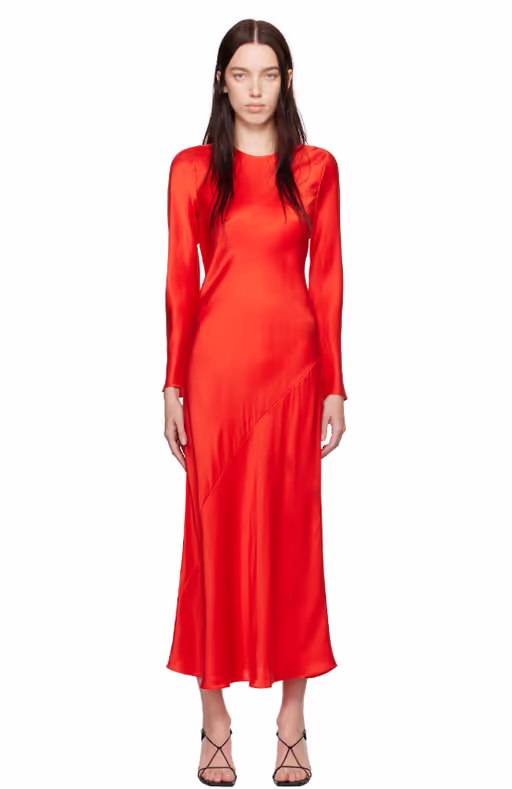 A woman wearing Silk Laundry red full sleeve bias maxi dress