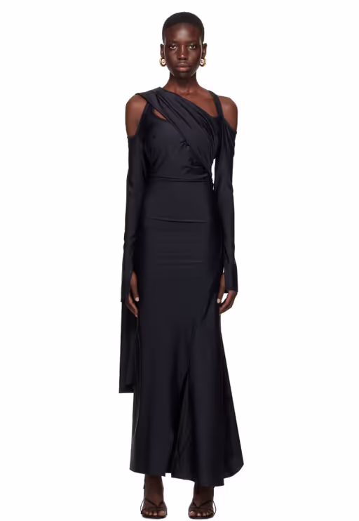 A woman wearing SRVC black siren maxi dress