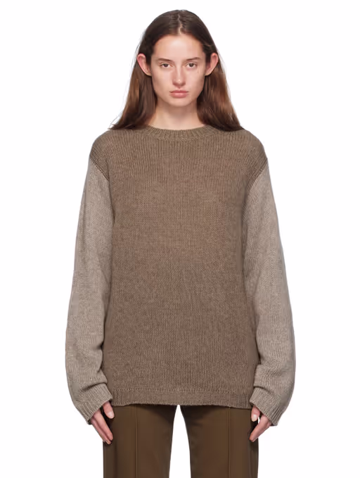 A woman wearing Sofie D'Hoore gray matcha sweater