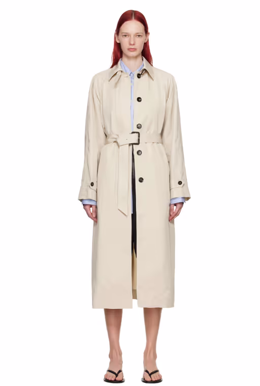 A woman wearing Teurn Studios beige belted trench coat