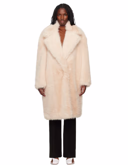 A woman wearing Sportmax pink notched lapel faux-fur coat