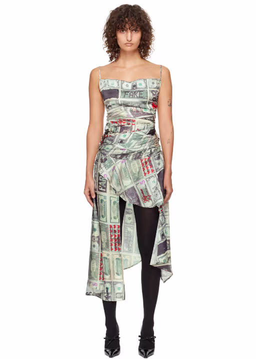 A woman wearing VAQUERA green dollar print minidress
