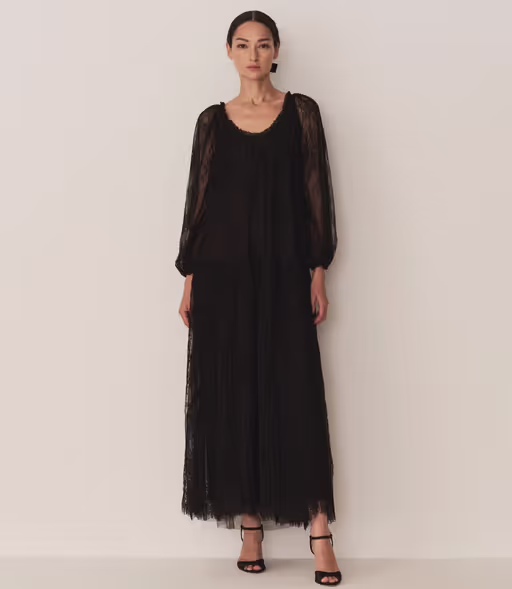 A woman wearing Doen nevaeh dress