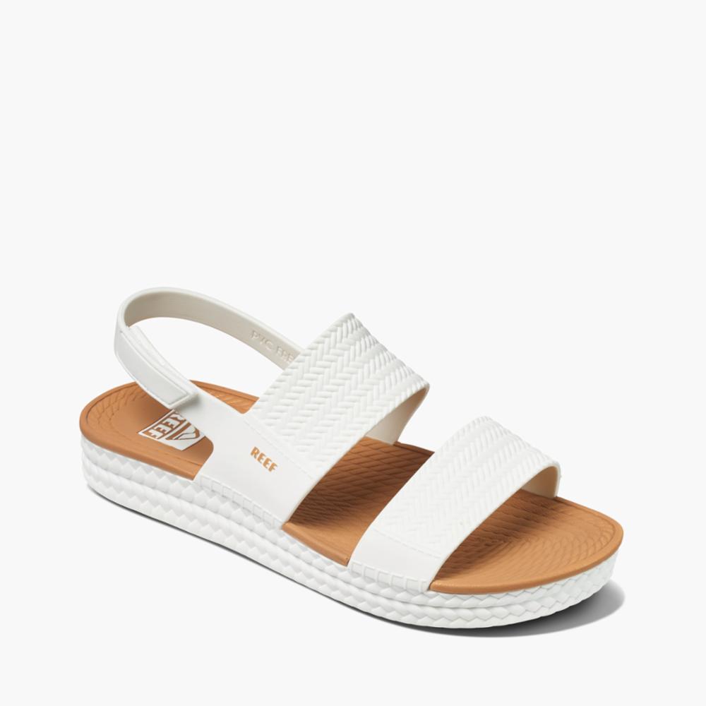 Reef white platform sandal with a tan woven footbed