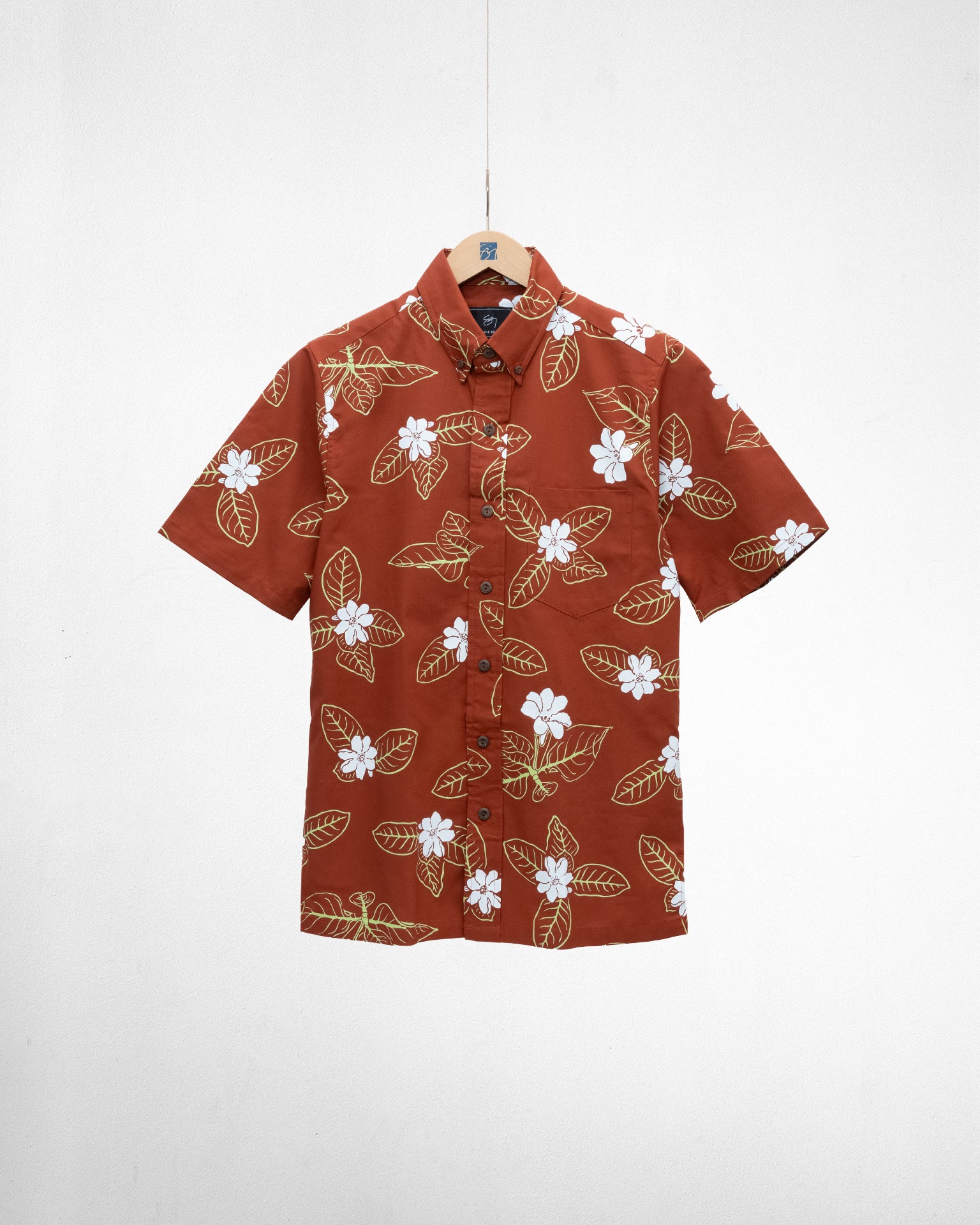 Sig Zane Designs rust aloha shirt with white flower print