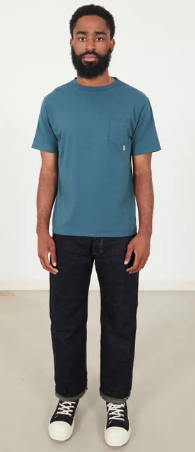 A man wearing Those That Know riding high standard pack pocket tee – blue
