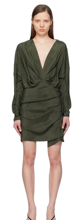 A woman wearing Gauge81 green asuka minidress